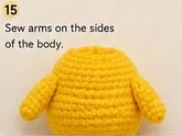 Headless yellow crocheted body with both arms sewn to the sides