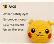 Close-up of the finished Pikachu face with round safety eyes, an embroidered mouth, and red cheek marks