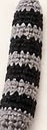 Finished raccoon tail with alternating black and grey stripe bands, tapering to a point at the tip
