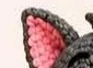 Finished two-tone Tom ear, gray on the outside curve with pink showing on the folded inner edge