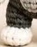 Finished gray Tom leg with a white foot, standing height matching the arms